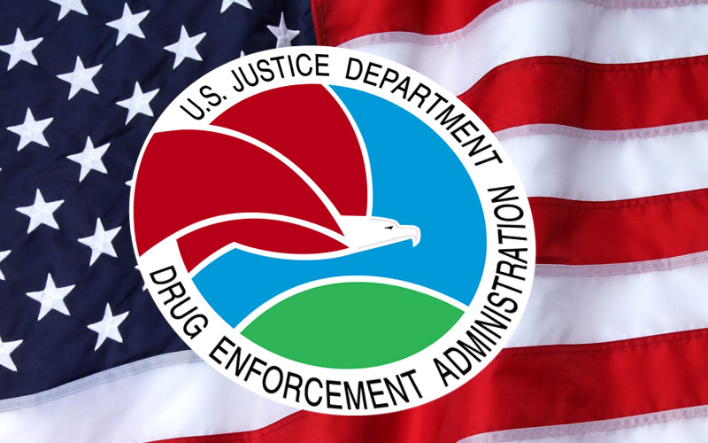 DEA logo overlaid on an American flag, symbolizing the reclassification of certain CBD products.